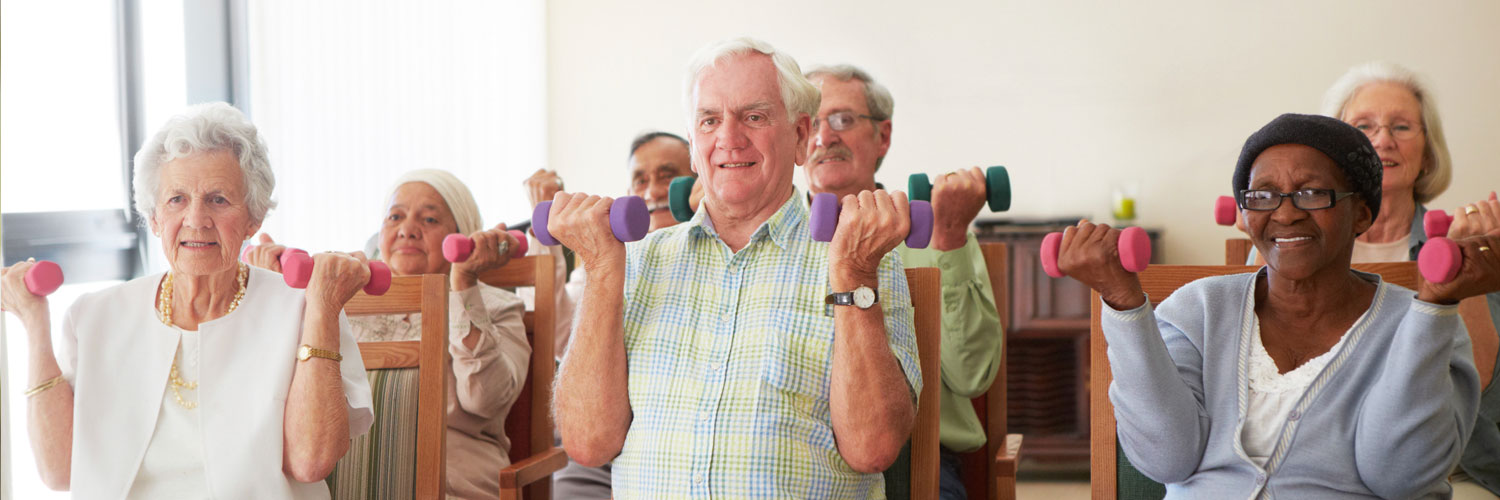 group of elderly residents exercising